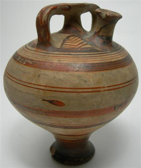 Appraisal: A Mycenaean pottery stirrup jar circa B C the shapely