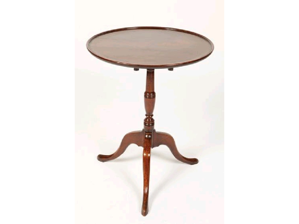 Appraisal: A GEORGE III STYLE MAHOGANY PILLAR TABLE with a circular