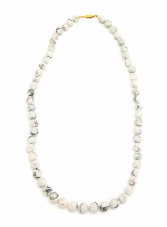 Appraisal: A White Buffalo Turquoise Beaded Necklace having round beads with