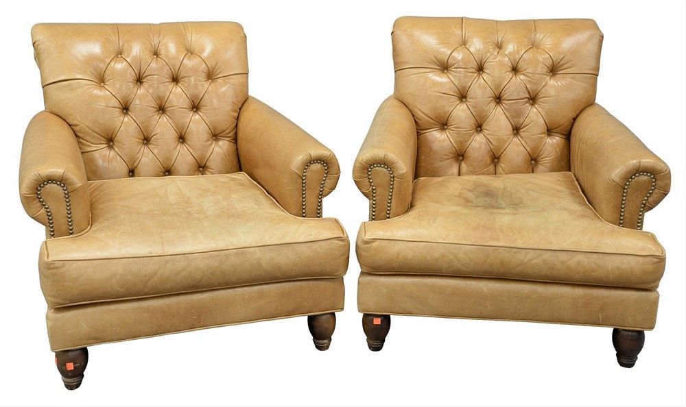 Appraisal: Pair of Leather Armchairs having tufted backs and brass tack