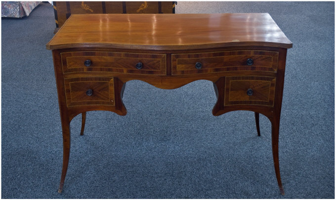 Appraisal: George the Third Style Serpentine Mahogany Sideboard with cross banding