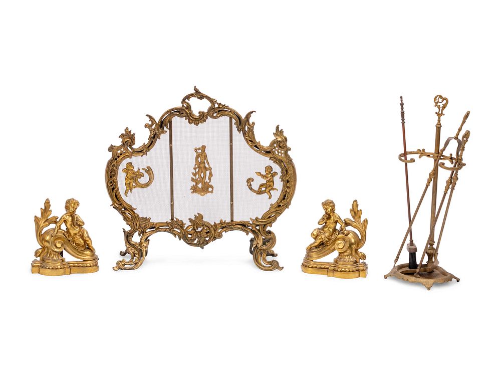 Appraisal: A Louis XV Style Gilt Bronze Four-Piece Fireplace Set A