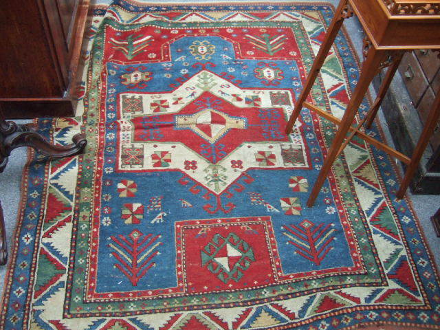 Appraisal: A Kazak prayer rug Caucasian mid th century the indigo