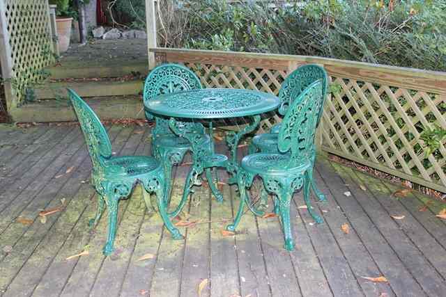 Appraisal: A GREEN PAINTED CAST ALUMINIUM CIRCULAR GARDEN TABLE with pierced