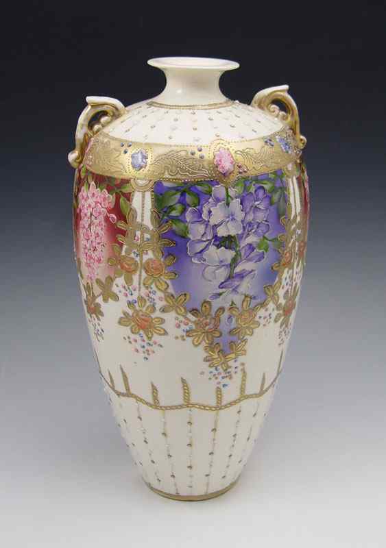 Appraisal: JAPANESE SATSUMA EARTHENWARE VASE Wisteria floral decoration ''h