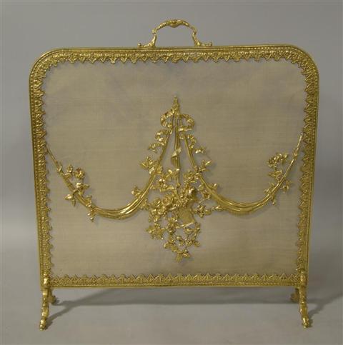 Appraisal: CLASSICAL STYLE BRASS FIRE SCREEN with applied decoration including brass