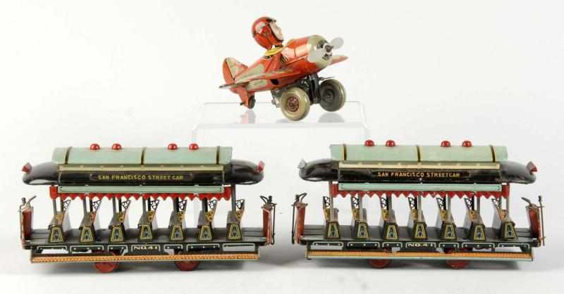 Appraisal: Lot of Tin Litho Vehicle Toys Description Japanese Includes one