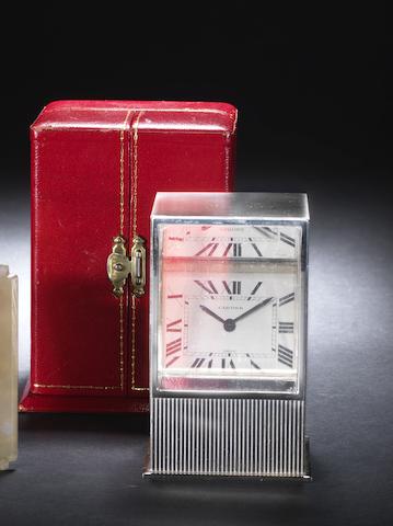 Appraisal: A late th century silver 'Prisma' mystery desk timepiece Cartier