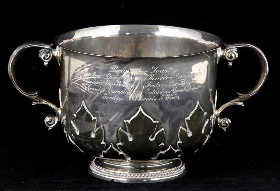 Appraisal: A silver porringer JLC London with scroll handles and raised