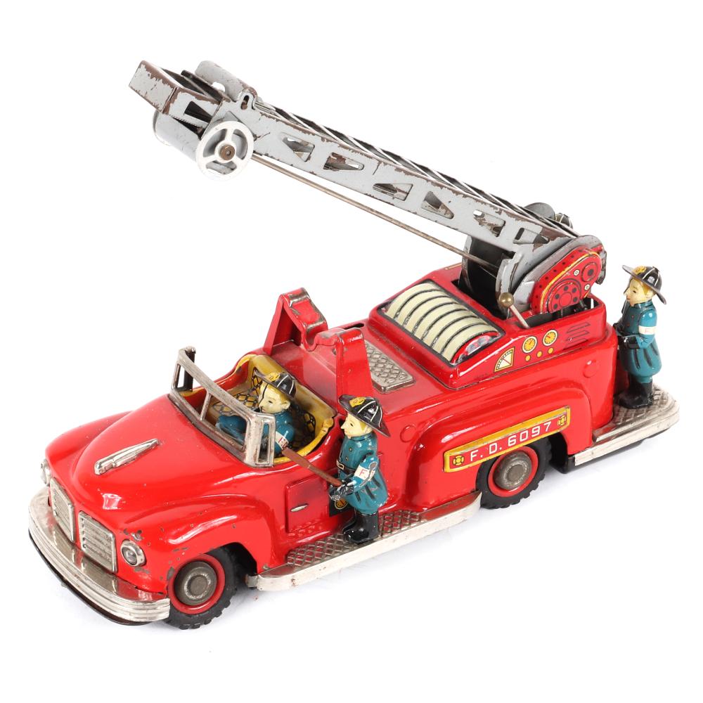 Appraisal: JAPAN S BATTERY OPERATED PUMP AND LADDER FIRETRUCK WITH FOUR