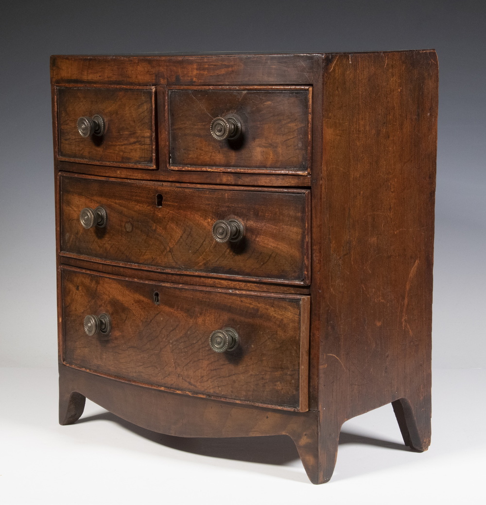 Appraisal: MINIATURE MAHOGANY HEPPLEWHITE CHEST Child Sized Bowfront in flame mahogany