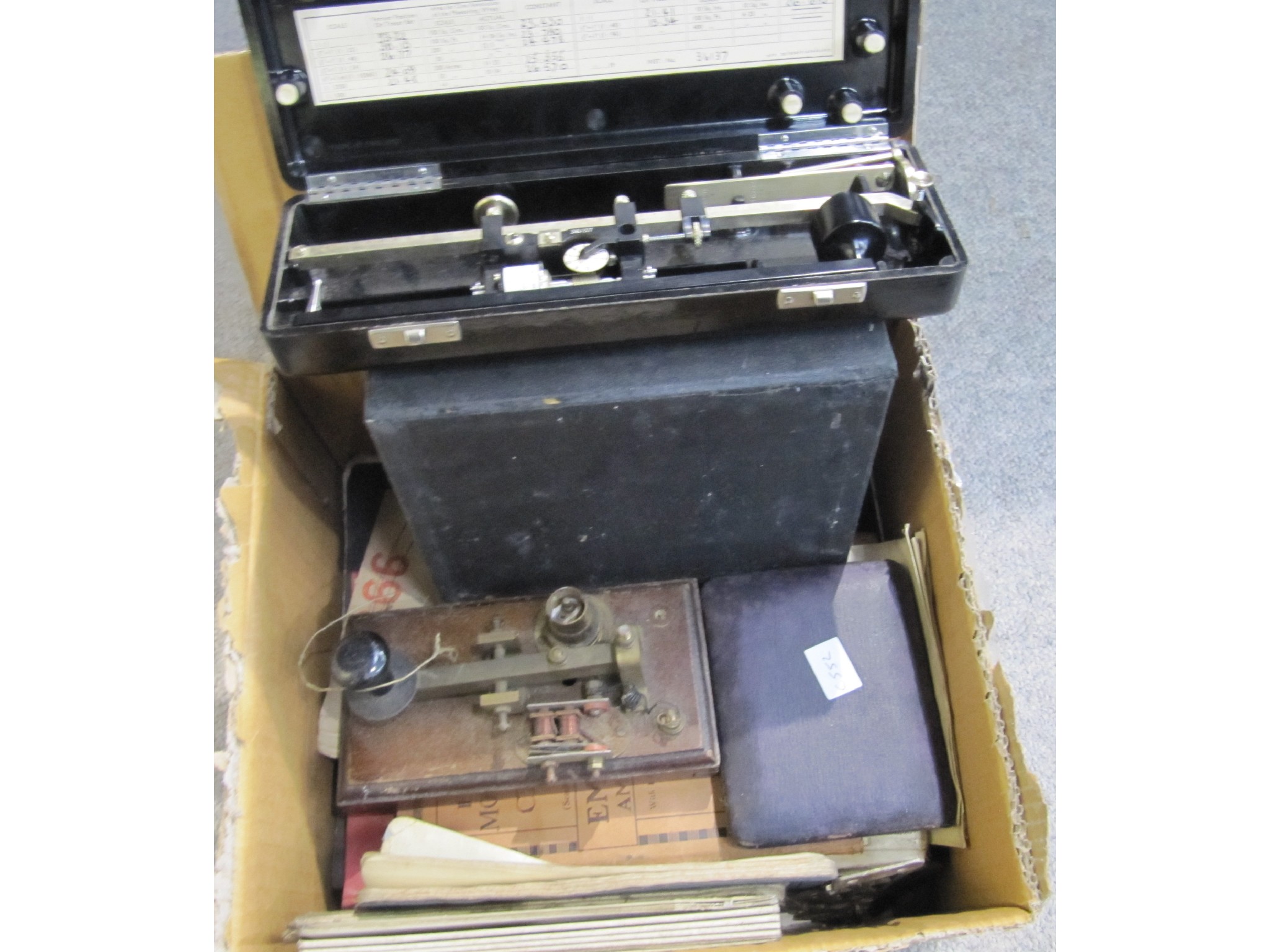 Appraisal: A lot comprising a telegraph key and assorted cased instruments