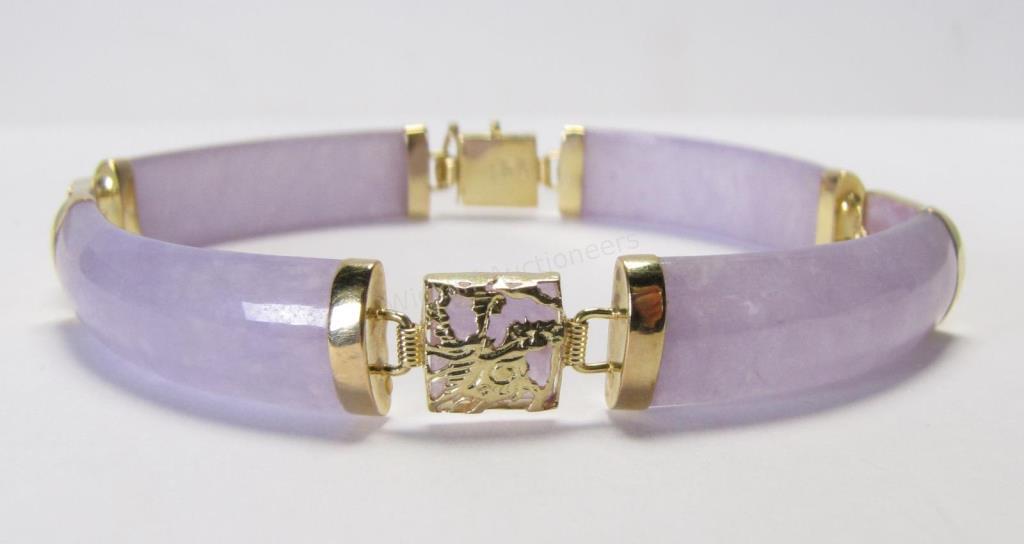 Appraisal: A K yellow gold accented light purple jadeite bracelet long