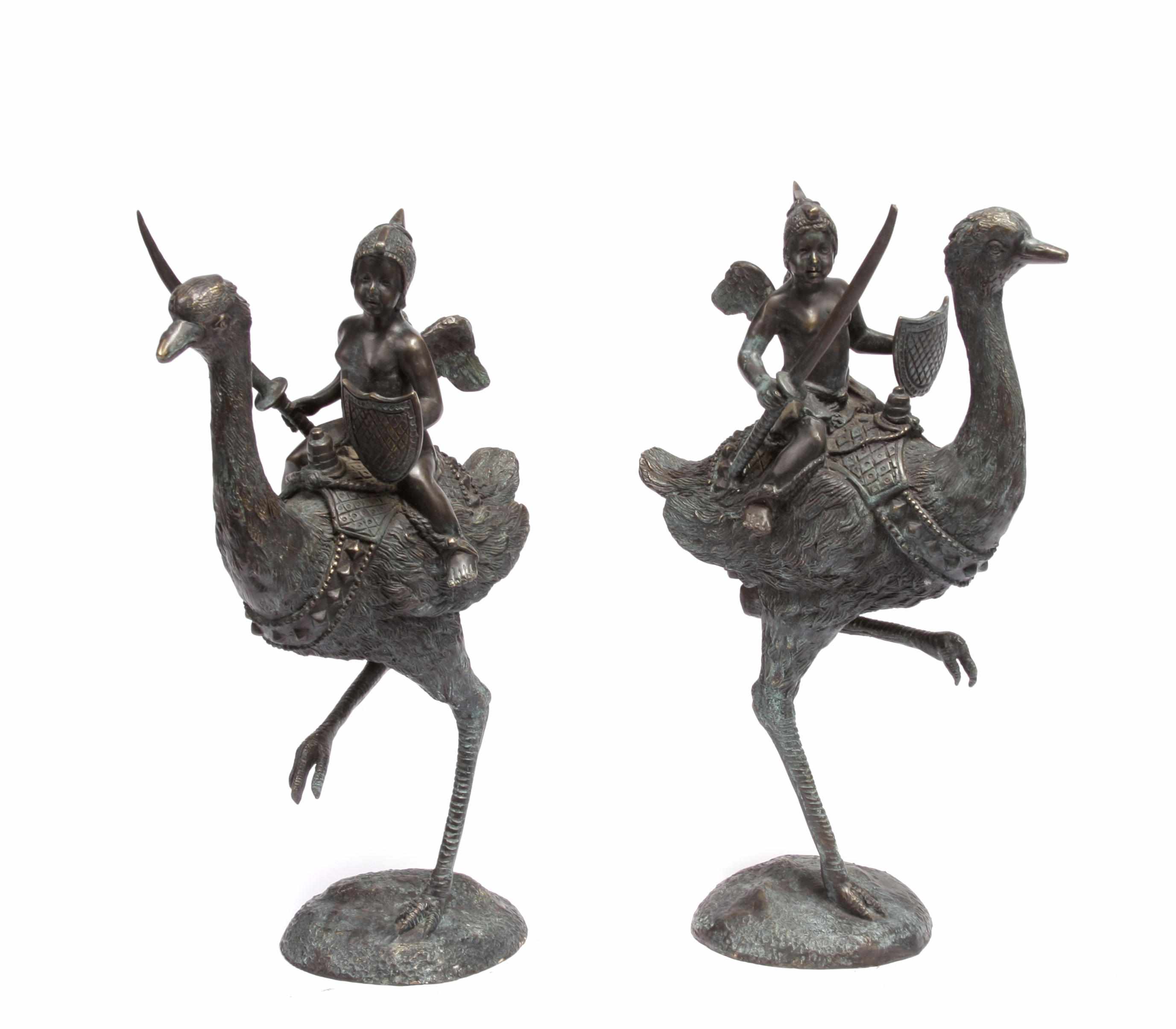 Appraisal: A pair of patinated bronze figural groups height in diameter