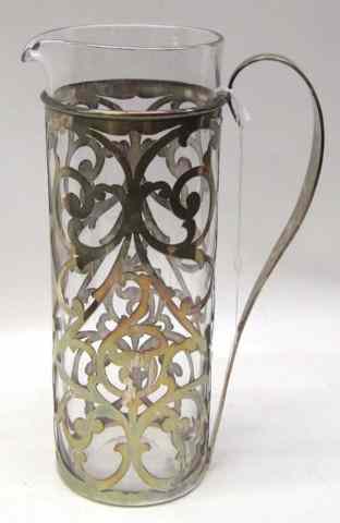 Appraisal: AMERICAN GLASS STERLING SILVER PITCHER the clear class pitcher fitted