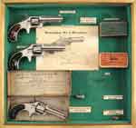 Appraisal: LOT OF THREE REMINGTON SMOOT REVOLVERS WITH DISPLAY CASE Smoot