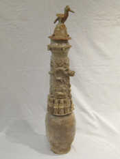 Appraisal: A tall Chinese glazed jar and cover with crane finial