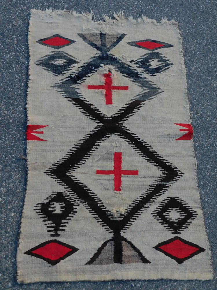 Appraisal: ANTIQUE NAVAJO RUG CROSSES Antique Navajo woven rug with crosses