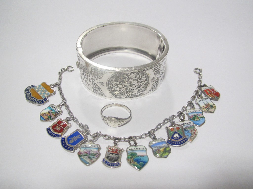 Appraisal: Lot comprising a Victorian engraved silver bangle a silver souvenir