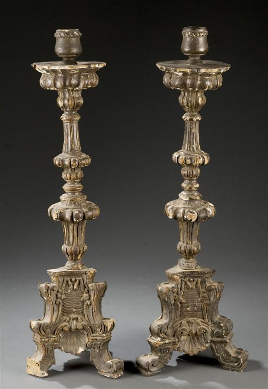 Appraisal: Italian wood gesso candlesticks th century Black painted candlesticks having