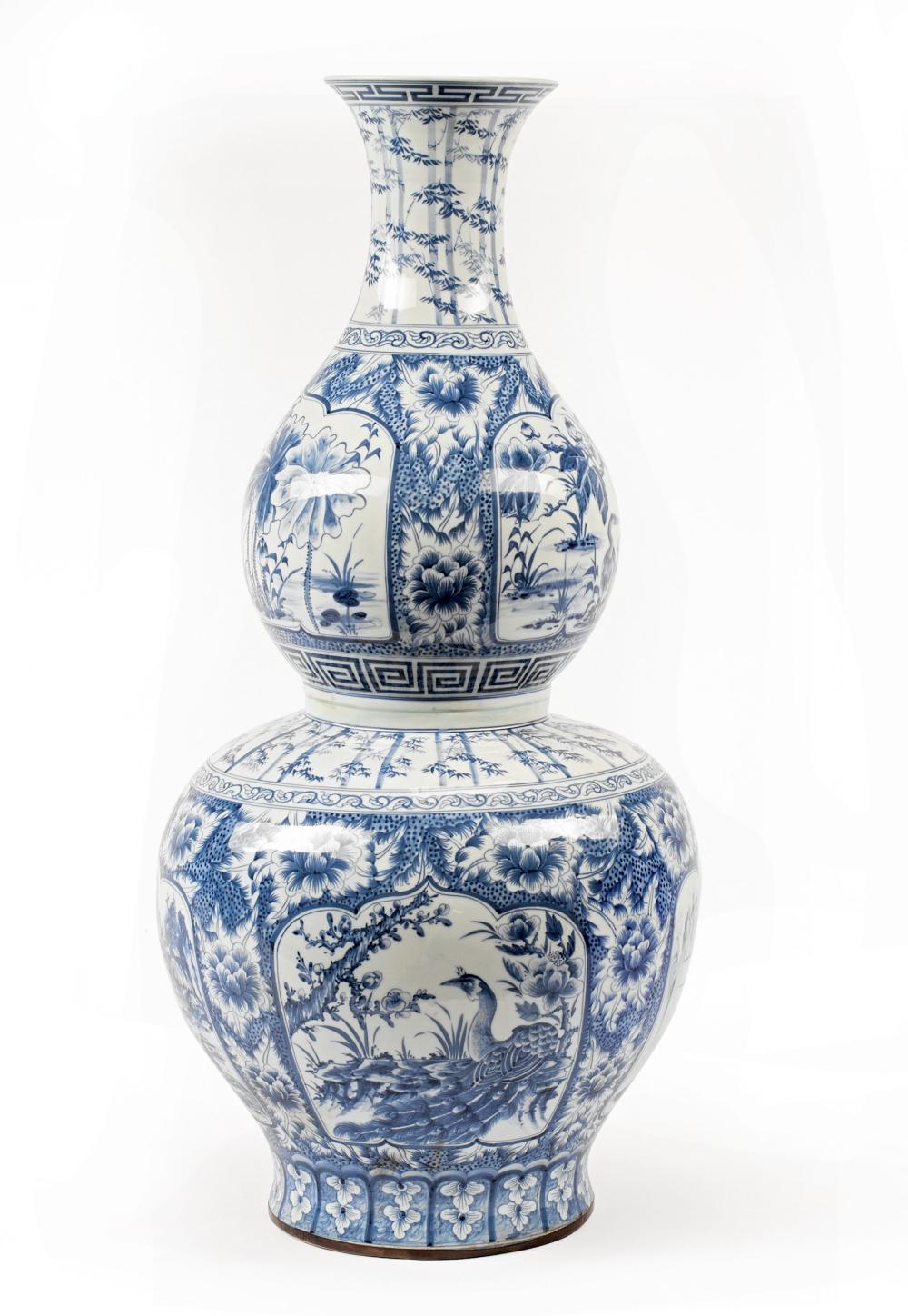 Appraisal: Japanese Blue and White Porcelain Double Gourd Vase decorated with