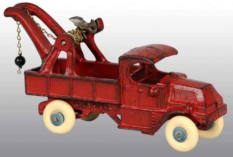 Appraisal: Cast Iron Champion Tow Truck Toy Description American Embossed Champion