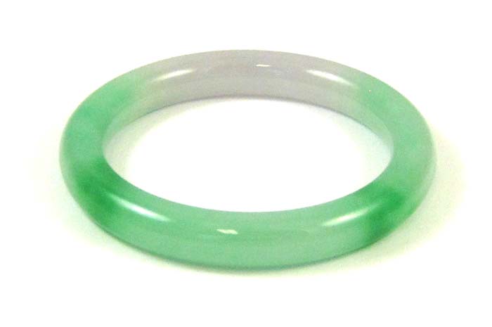 Appraisal: HEAVY GREEN AND WHITE JADE BANGLE weighing grams The round