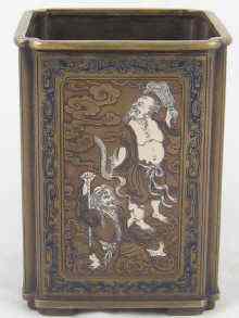 Appraisal: A Chinese bronze rectangular plant stand with recurved corners inlaid