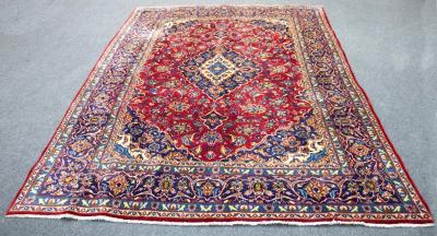 Appraisal: A Kashan rug the central oval medallion to a wine