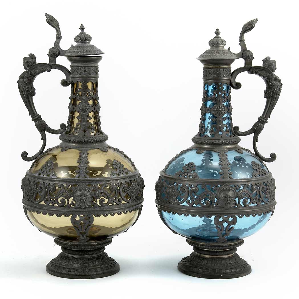 Appraisal: Pair of Baroque Style Pewter Mounted Glass Ewers Height inches