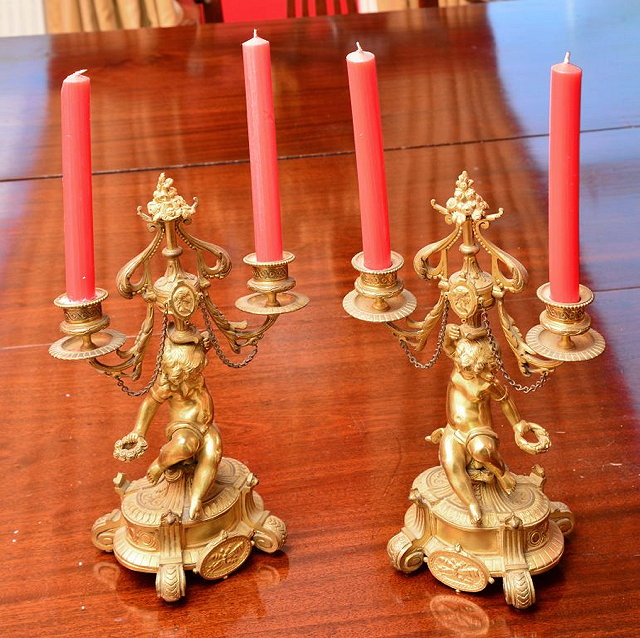 Appraisal: A PAIR OF FRENCH GILT METAL TWO BRANCH CANDELABRA each