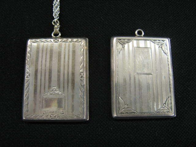 Appraisal: Pair of Sterling Silver Lockets bookstyle circa 's fine engraving