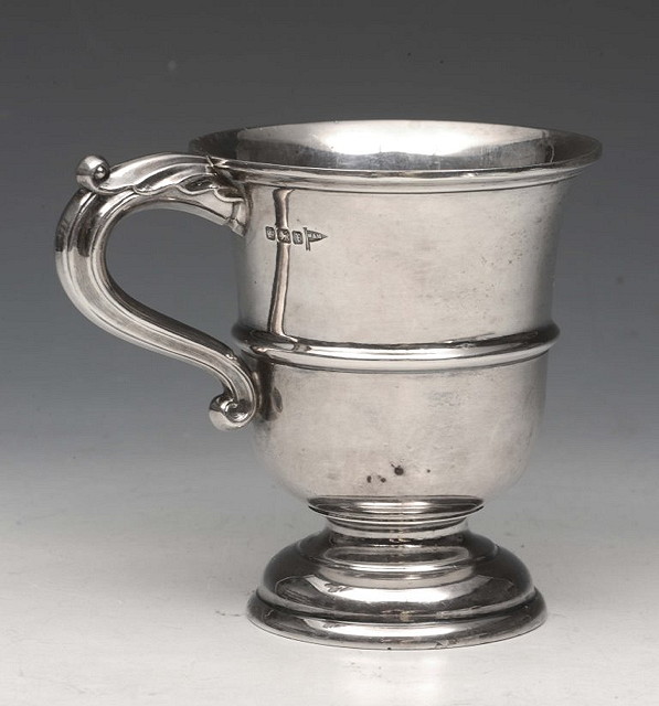 Appraisal: A SILVER BEAKER of tapering form on pedestal foot with