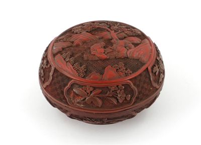 Appraisal: A Chinese red cinnabar lacquer circular box and cover carved