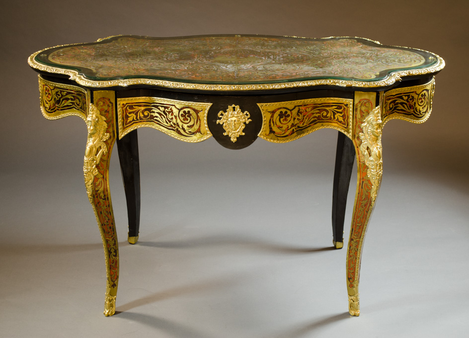 Appraisal: NAPOLEON III 'BOULLE' INLAID EBONIZED AND ORMOLU MOUNTED CENTER TABLE