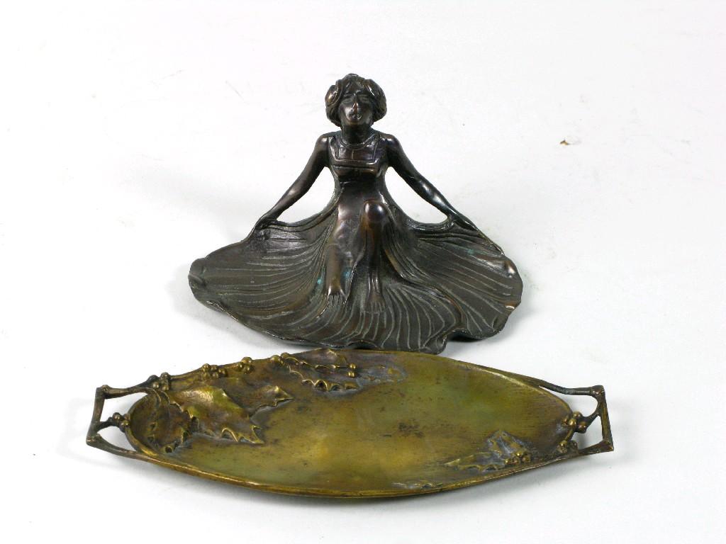 Appraisal: An Art Nouveau bronze two handled Dish moulded holly leaves