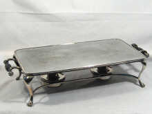 Appraisal: A twin burner silver plated hot plate circa measurements approx