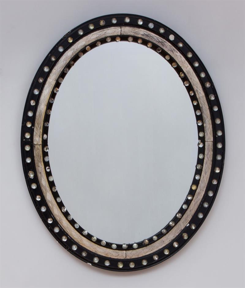 Appraisal: ANGLO-IRISH EBONIZED AND SILVER-GILT OVAL MIRROR x in Ambassador and