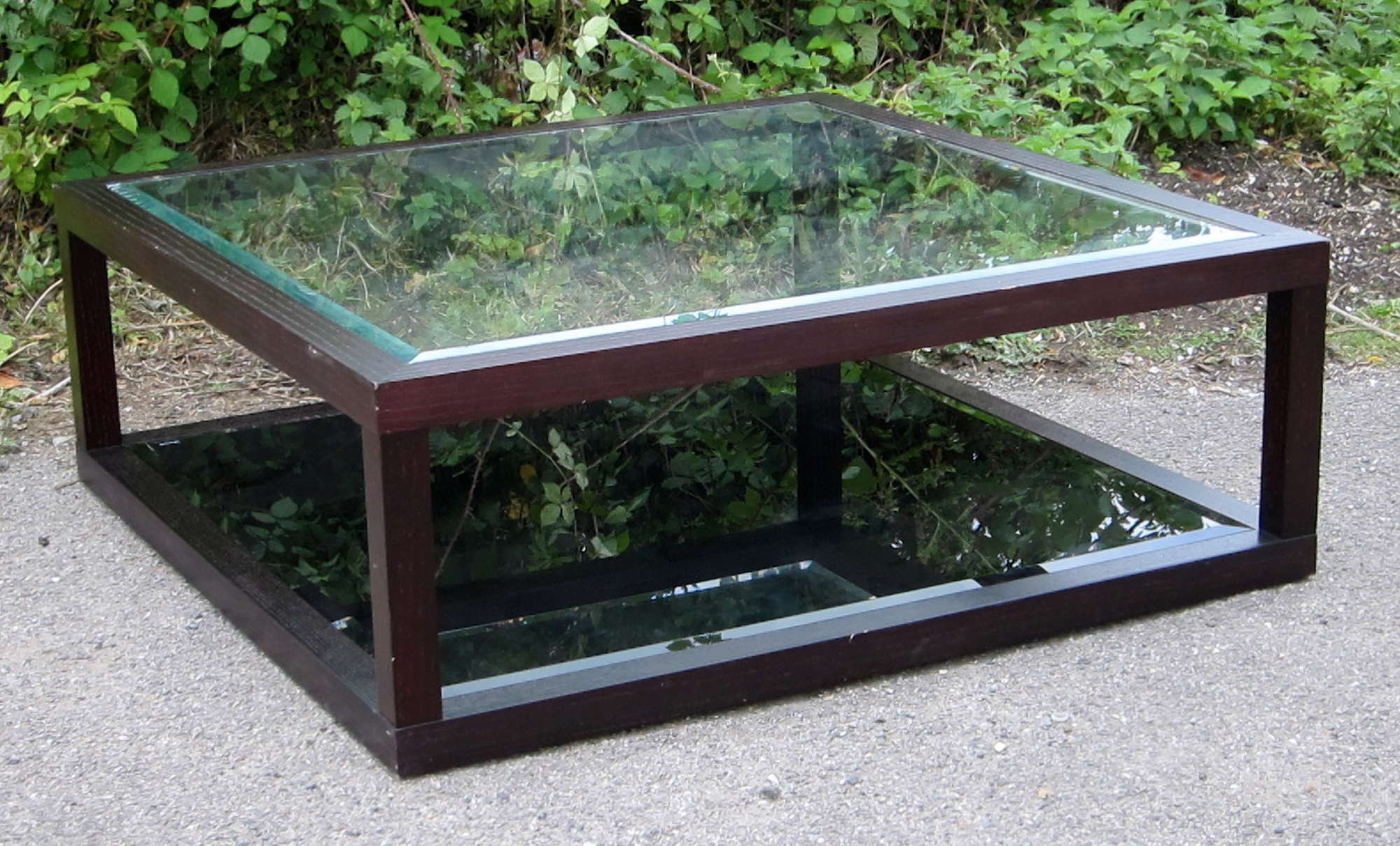 Appraisal: Stained oak two tier coffee table with glass by Dwell