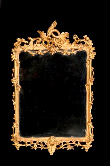 Appraisal: A th century giltwood pier mirror the rectangular plate within