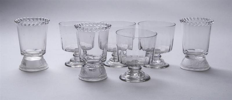 Appraisal: GROUP OF FOUR BLOWN GLASS FOOTED BOWLS Together with three