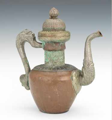 Appraisal: A Large Tibetan Copper and Silver Metal Ewer Hand hammered