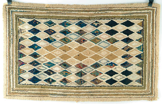 Appraisal: HOOKED RUG WITH DIAMOND PATTERN Central field with colorful connected