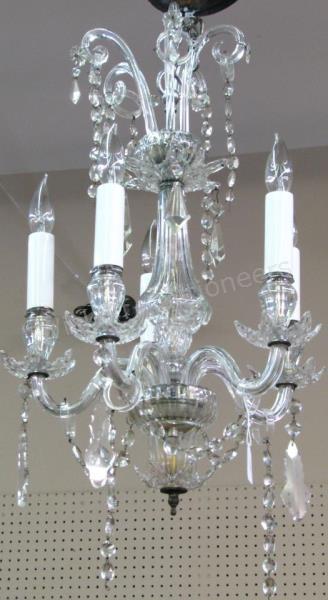 Appraisal: A pair of crystal chandeliers with candlestick style fixtures crystal