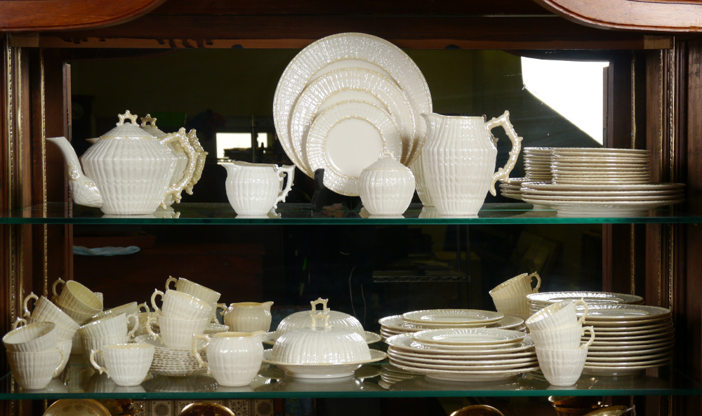 Appraisal: IRISH BELLEEK PORCELAIN CHINA SET In the Limpet pattern approx