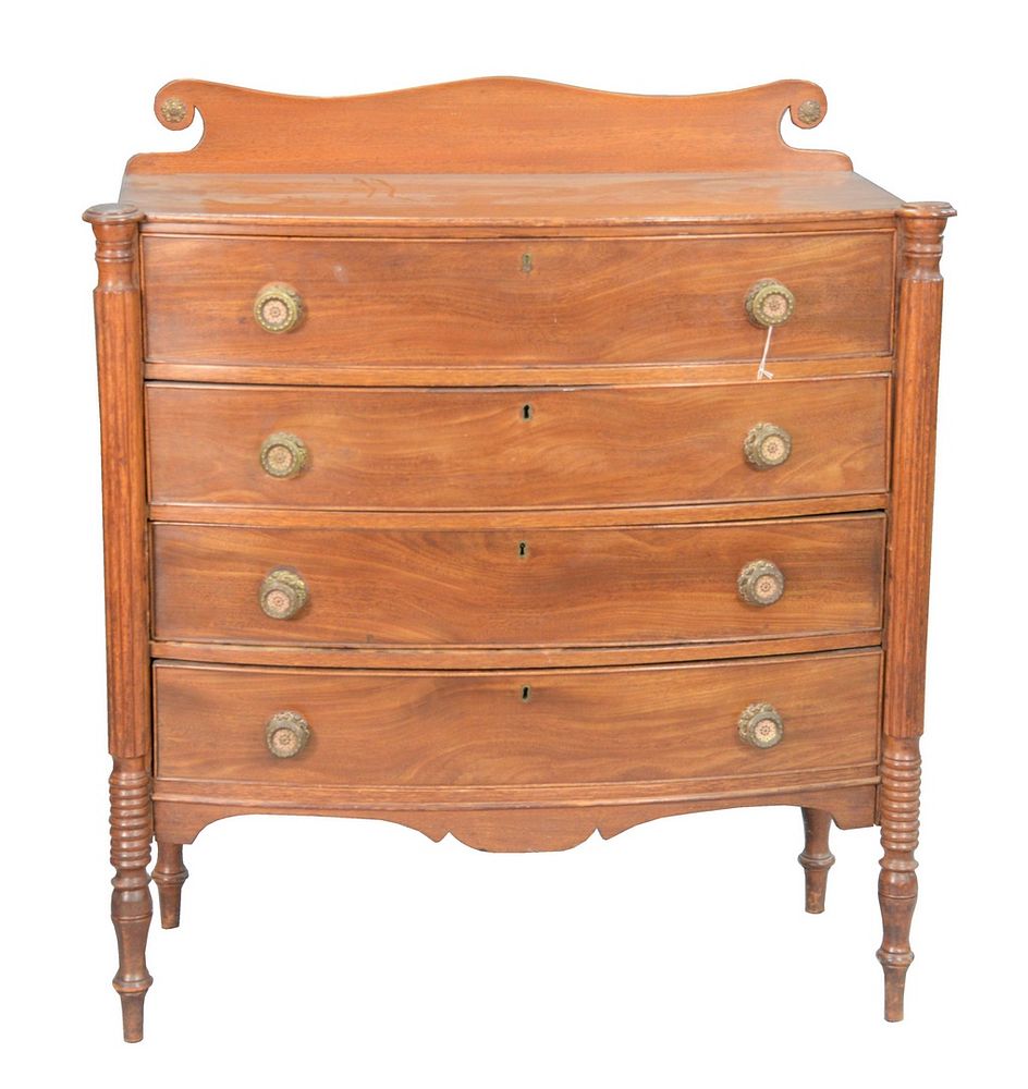 Appraisal: Sheraton Mahogany Bowed Front Chest with turret corners over four