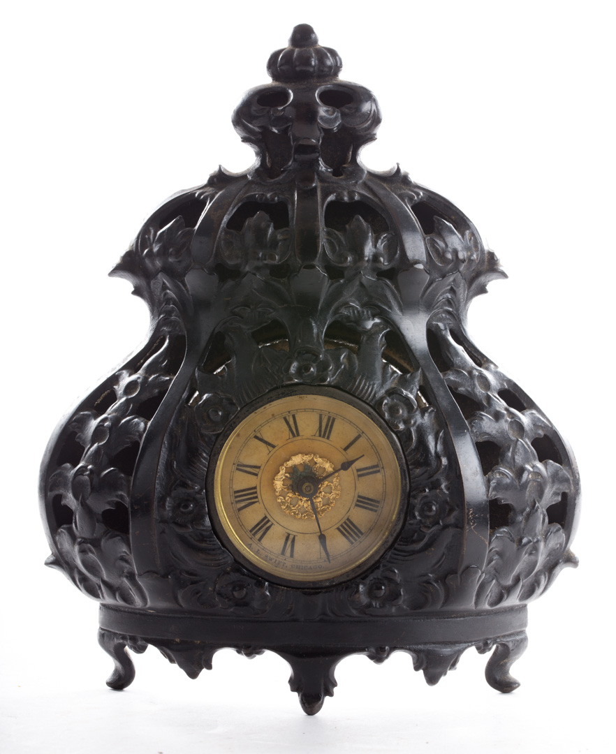 Appraisal: Deemer Mfg Co cast iron mantel clock late th century