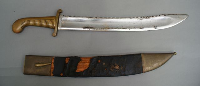 Appraisal: A Russian Sapper's sidearm broad inch sawback blade with cast