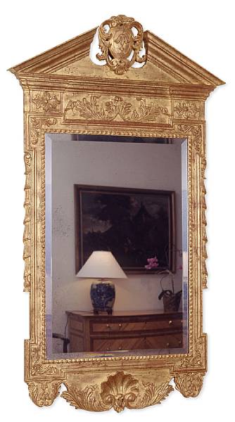 Appraisal: A Chippendale style giltwood mirror The architrave crest centering a