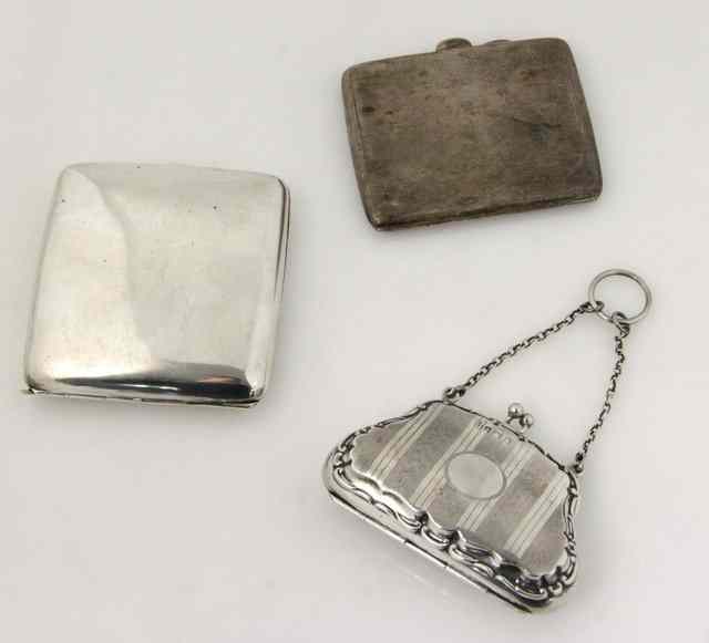 Appraisal: A silver purse Birmingham and two silver cigarette cases approximately